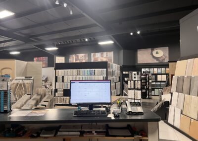 Design counter in front of a wall of tile samples in Evansville IN