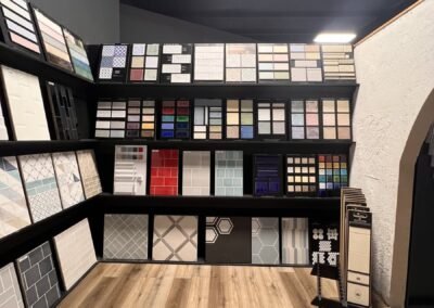 Luxury vinyl plank floor in front of a wall of tile samples in Evansville IN