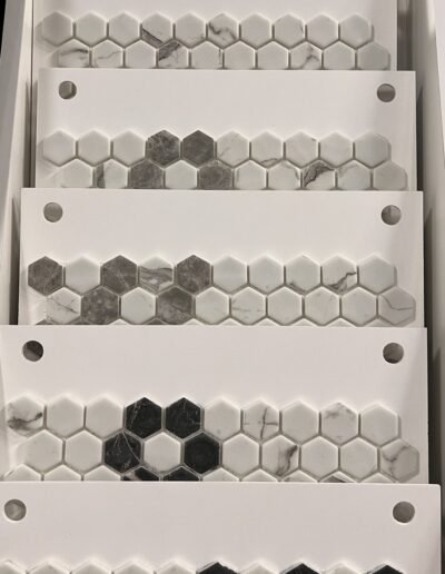 White and gray marble hexagon mosaic tile samples in Evansville IN