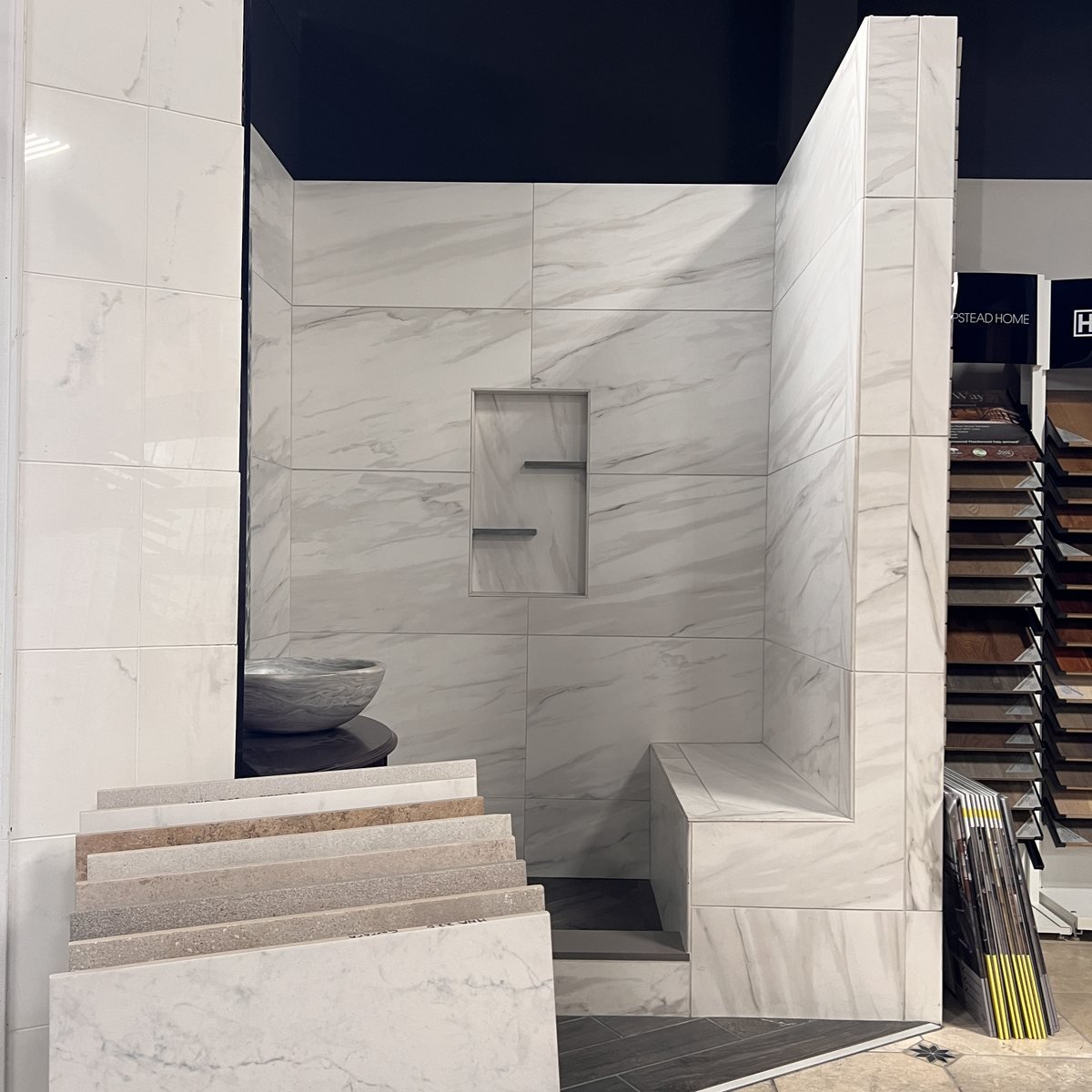 porcelain-shower-display-evansville-in White marble look porcelain shower display with niche and bench in Evansville IN